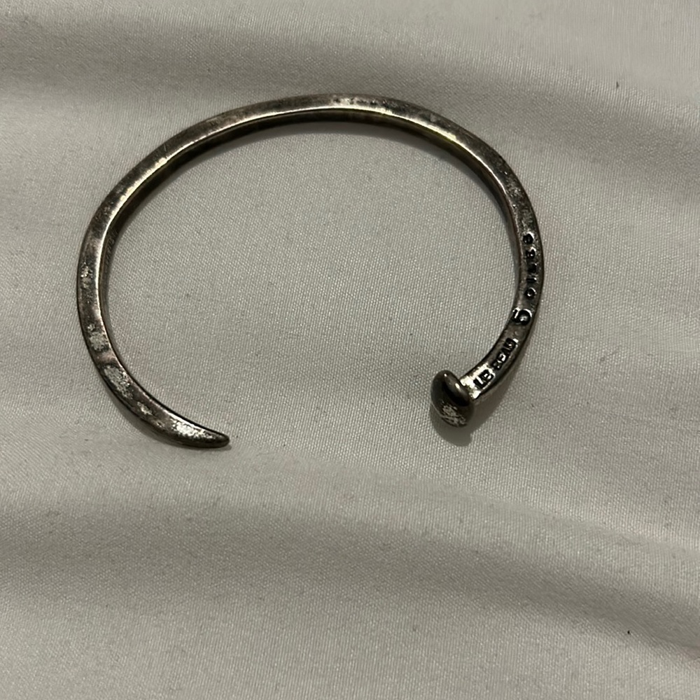 GILES & BROTHER NAIL BRACELET